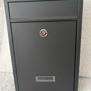 Brand new Sleek Black Lockable mailbox